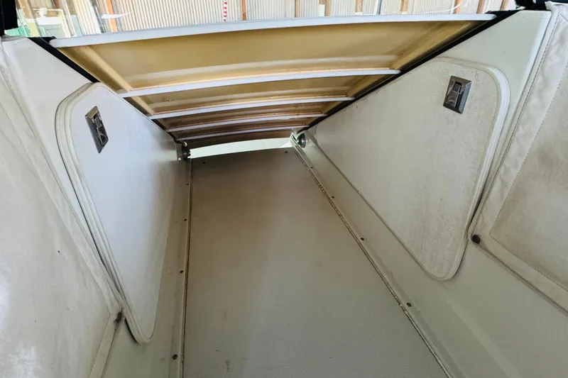 Slide: The Image of Interior view of 1989 Carver 38 Santego boat storage compartment. - 74