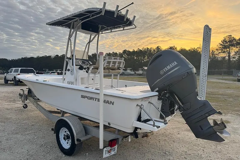 Slide: The Image of 2016 Sportsman Masters 207 Bay Boat with Yamaha engine at sunset. - 3