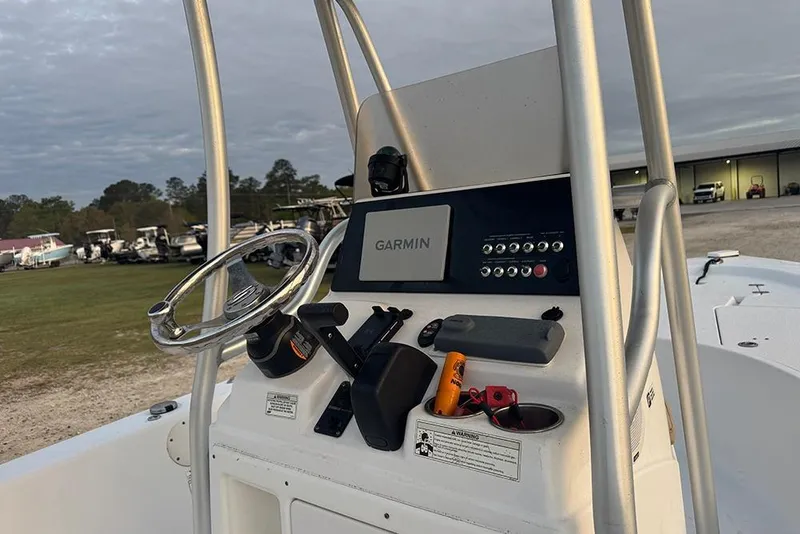 Slide: The Image of 2016 Sportsman Masters 207 Bay Boat console with Garmin navigation system. - 8