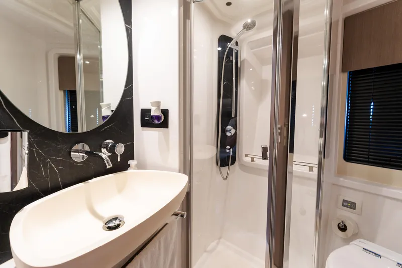Slide: The Image of Luxurious bathroom in 2023 Azimut Fly 50 yacht with modern fixtures and elegant design. - 102