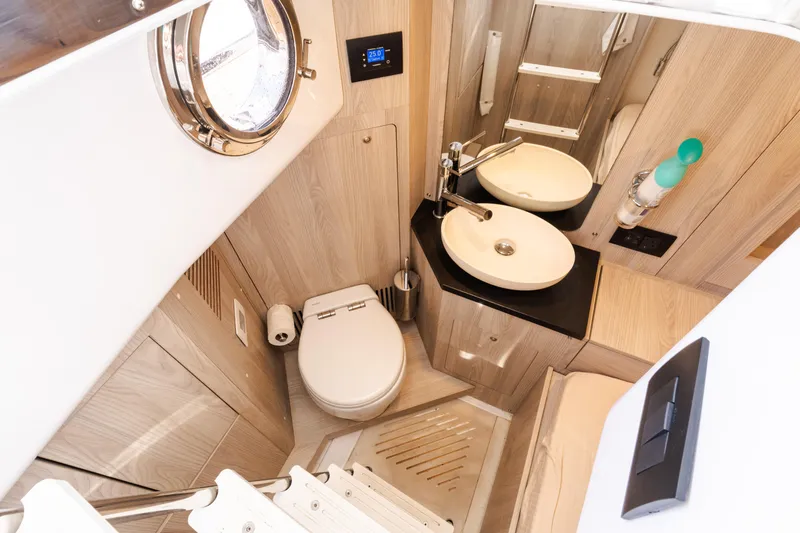 Slide: The Image of Luxurious bathroom in 2023 Azimut Fly 50 yacht with modern fixtures and elegant design. - 106