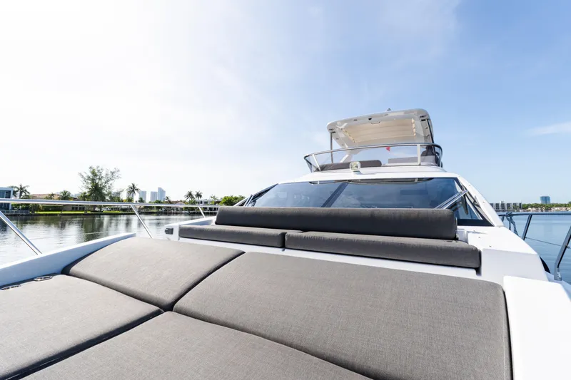 Slide: The Image of 2023 Azimut Fly 50 yacht with spacious sunbathing area on calm water. - 27