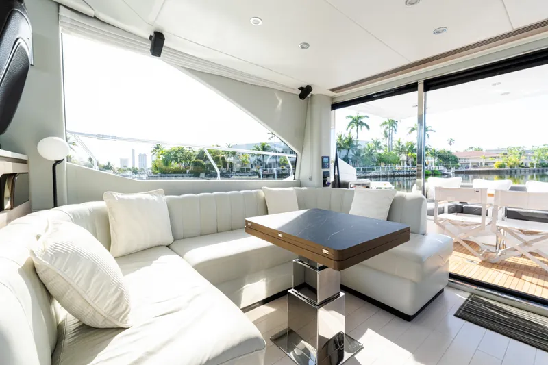 Slide: The Image of Luxurious interior of 2023 Azimut Fly 50 yacht with elegant seating and scenic views. - 61