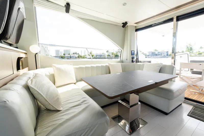 Slide: The Image of Luxurious interior of 2023 Azimut Fly 50 yacht with elegant seating and modern table. - 63