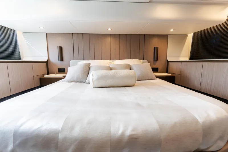 Slide: The Image of Luxurious bedroom interior of 2023 Azimut Fly 50 yacht with elegant bedding. - 86