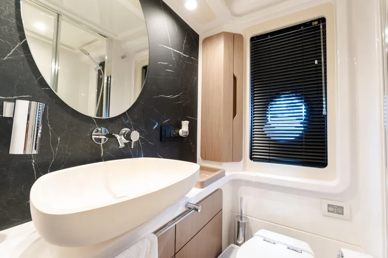 Slide: The Image of Luxurious bathroom interior of 2023 Azimut Fly 50 yacht with modern fixtures. - 93