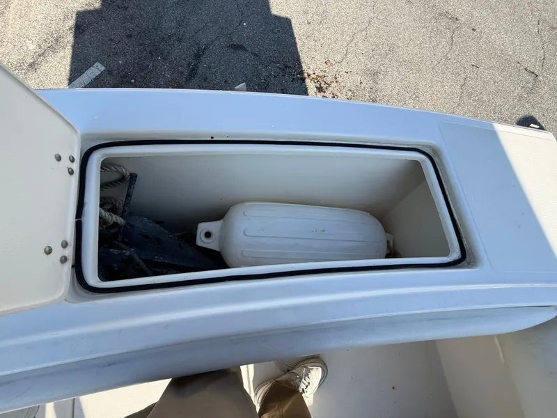 Slide: The Image of Storage compartment on a 2004 Albemarle 268 Express Fisherman boat. - 22