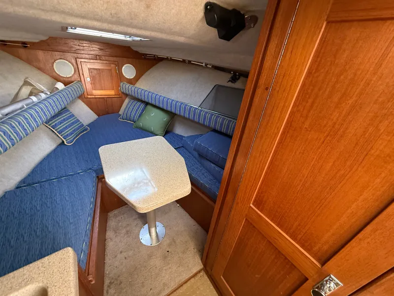 Slide: The Image of Interior of 2004 Albemarle 268 Express Fisherman with blue upholstery. - 37