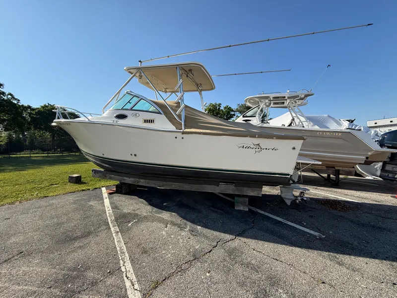 Slide: The Image of 2004 Albemarle 268 Express Fisherman boat on parking lot. - 49
