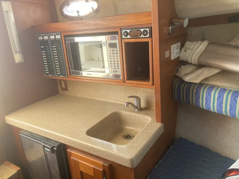 Slide: The Image of Galley area in a 2004 Albemarle 268 Express Fisherman yacht. - 5