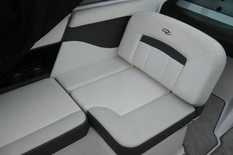 Slide: The Image of 2017 Regal 2000 ES Bowrider interior seating with white and black upholstery. - 16