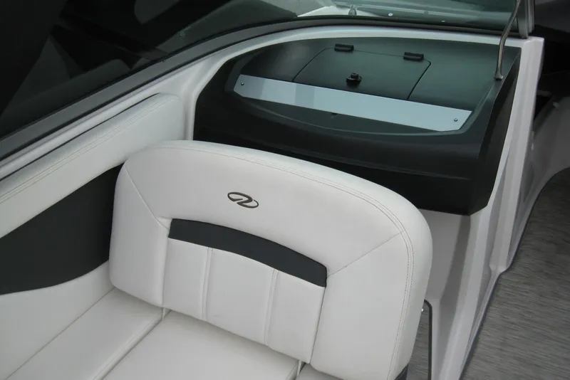 Slide: The Image of 2017 Regal 2000 ES Bowrider interior with white seating and dashboard detail. - 17