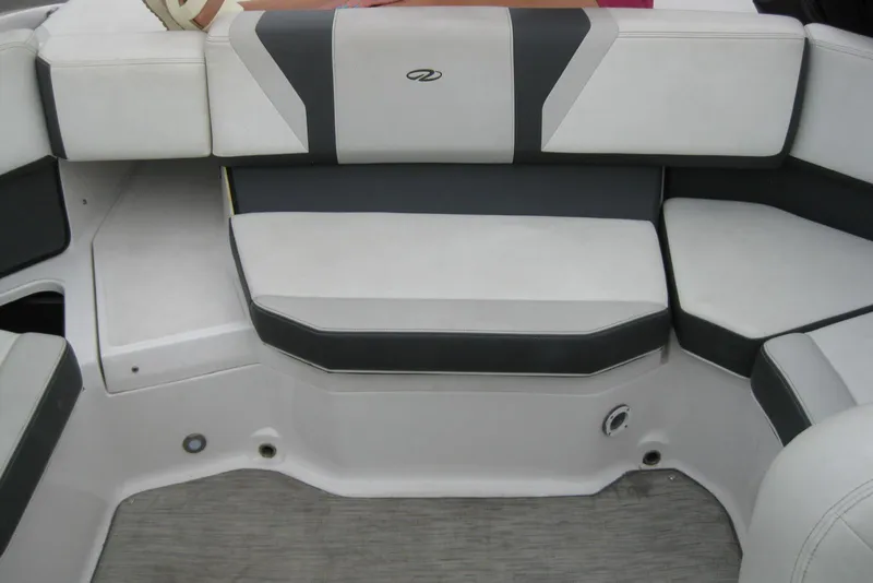 Slide: The Image of 2017 Regal 2000 ES Bowrider interior seating with gray and white upholstery. - 19