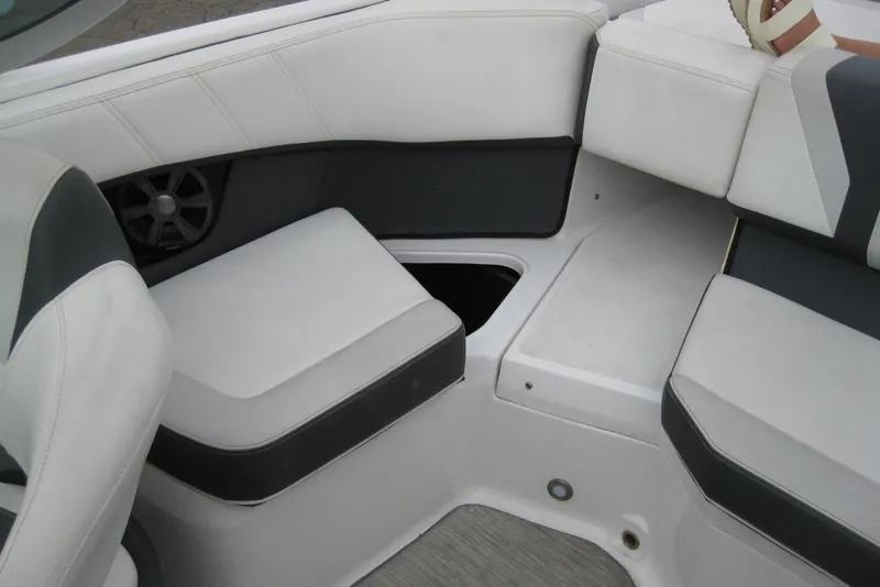 Slide: The Image of 2017 Regal 2000 ES Bowrider interior seating with storage compartment. - 21