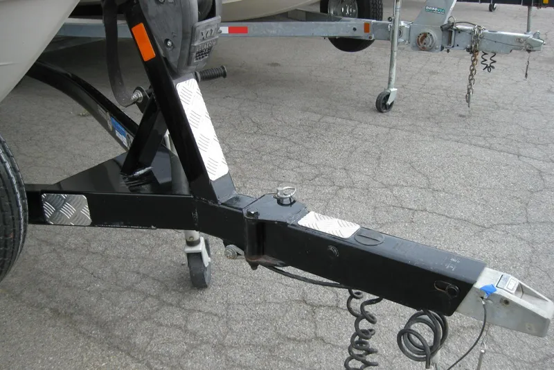 Slide: The Image of Trailer hitch of a 2017 Regal 2000 ES Bowrider on pavement. - 28