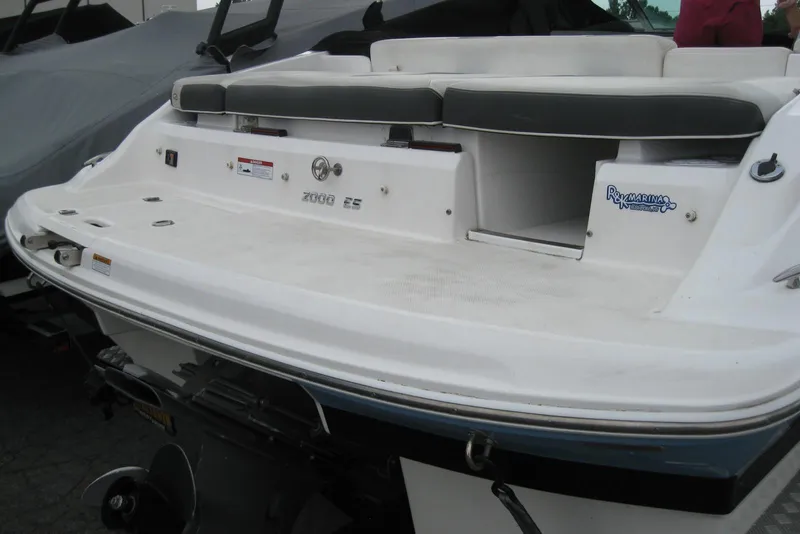 Slide: The Image of 2017 Regal 2000 ES Bowrider boat rear view with seating and storage. - 5