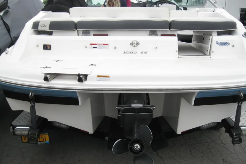 Slide: The Image of Rear view of a 2017 Regal 2000 ES Bowrider boat with visible propeller. - 6