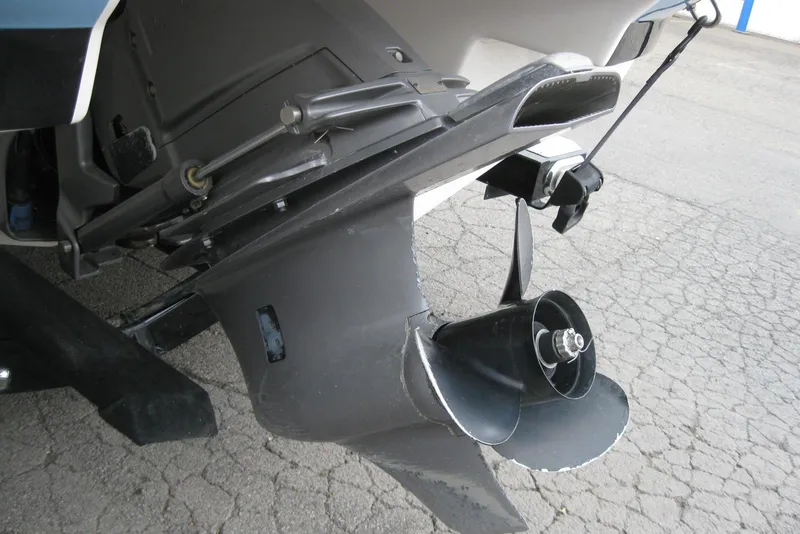 Slide: The Image of Propeller and stern drive of 2017 Regal 2000 ES Bowrider boat on pavement. - 7
