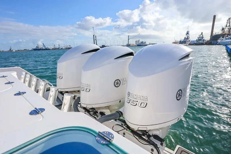 Slide: The Image of 2017 Everglades 355 Center Console with Yamaha 350 engines in a harbor setting. - 29