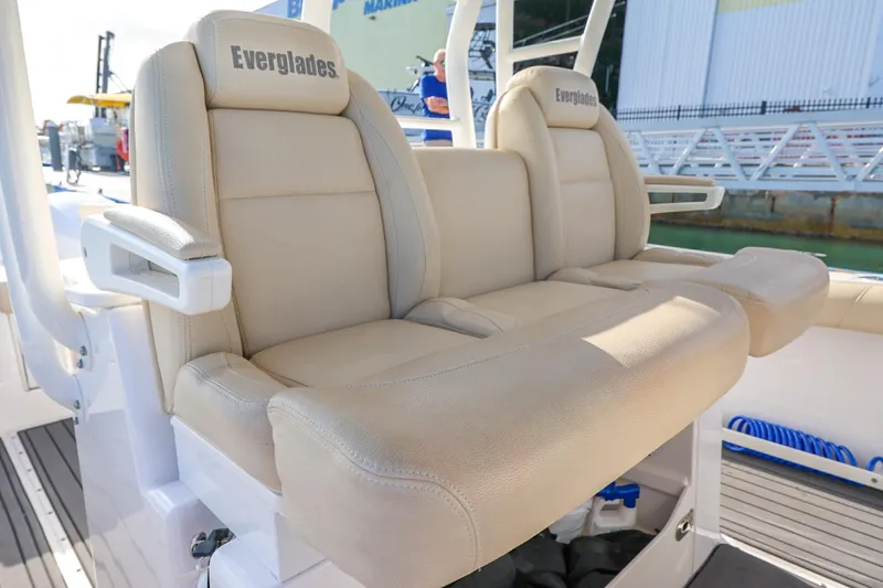 Slide: The Image of Beige seating on 2017 Everglades 355 Center Console boat, dockside view. - 41
