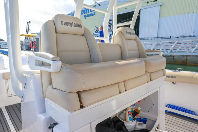 Slide: The Image of Luxurious seating on 2017 Everglades 355 Center Console boat at marina. - 42