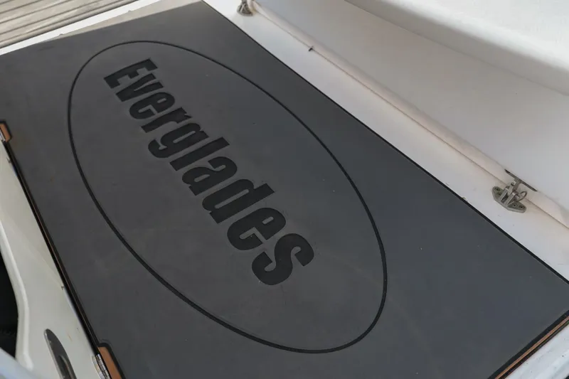 Slide: The Image of 2017 Everglades 355 Center Console boat deck with logo. - 46