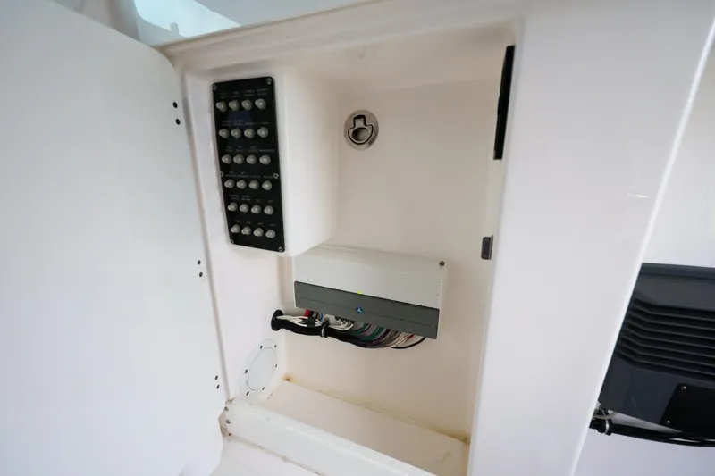Slide: The Image of Electrical panel inside 2017 Everglades 355 Center Console boat compartment. - 70