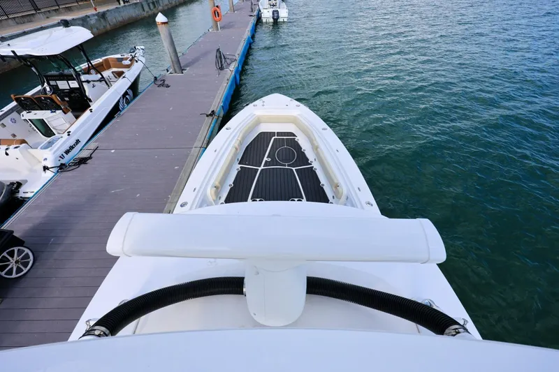 Slide: The Image of 2017 Everglades 355 Center Console boat docked at marina, viewed from above. - 73