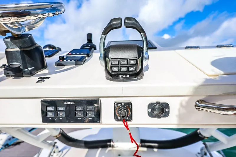 Slide: The Image of Control panel of 2017 Everglades 355 Center Console boat with Yamaha throttle. - 78