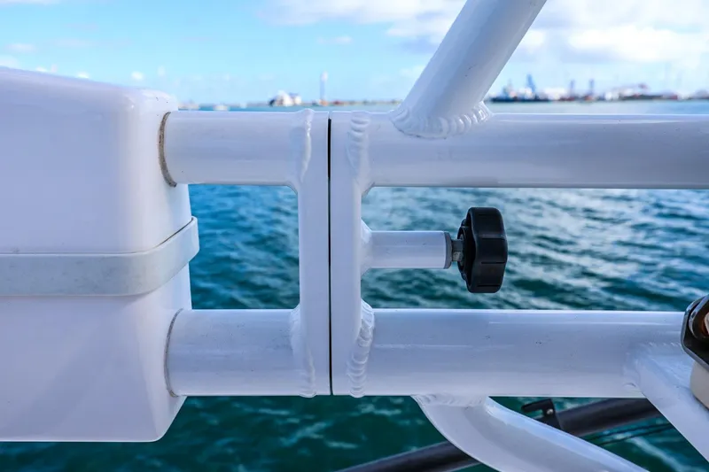 Slide: The Image of Close-up of Everglades 355 Center Console boat railing, 2017 model, with ocean background. - 90