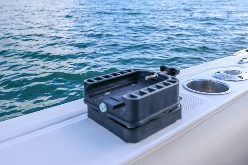 Slide: The Image of Everglades 355 Center Console boat detail with cup holder, 2017 model, on water. - 97