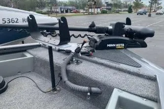 Slide: The Image of 2016 Tracker Pro Team 175 TF boat with Minn Kota trolling motor in parking lot. - 4