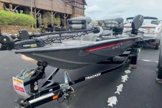 Slide: The Image of 2016 Tracker Pro Team 175 TF boat on trailer, parked outdoors. - 6