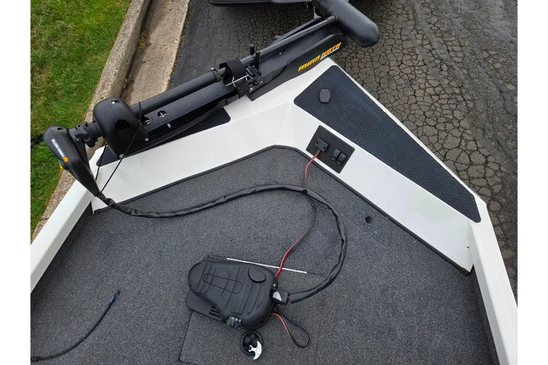 Slide: The Image of 2018 Ranger RT188C boat deck with trolling motor and foot pedal controls. - 17