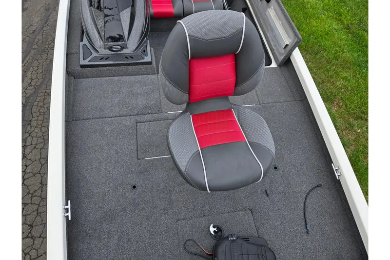 Slide: The Image of 2018 Ranger RT188C boat interior with red and gray seating on a carpeted deck. - 18