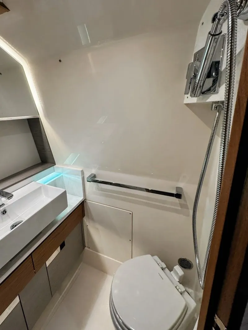 Slide: The Image of Luxurious bathroom of 2024 Tiara Yachts 38 LS with modern amenities. - 13