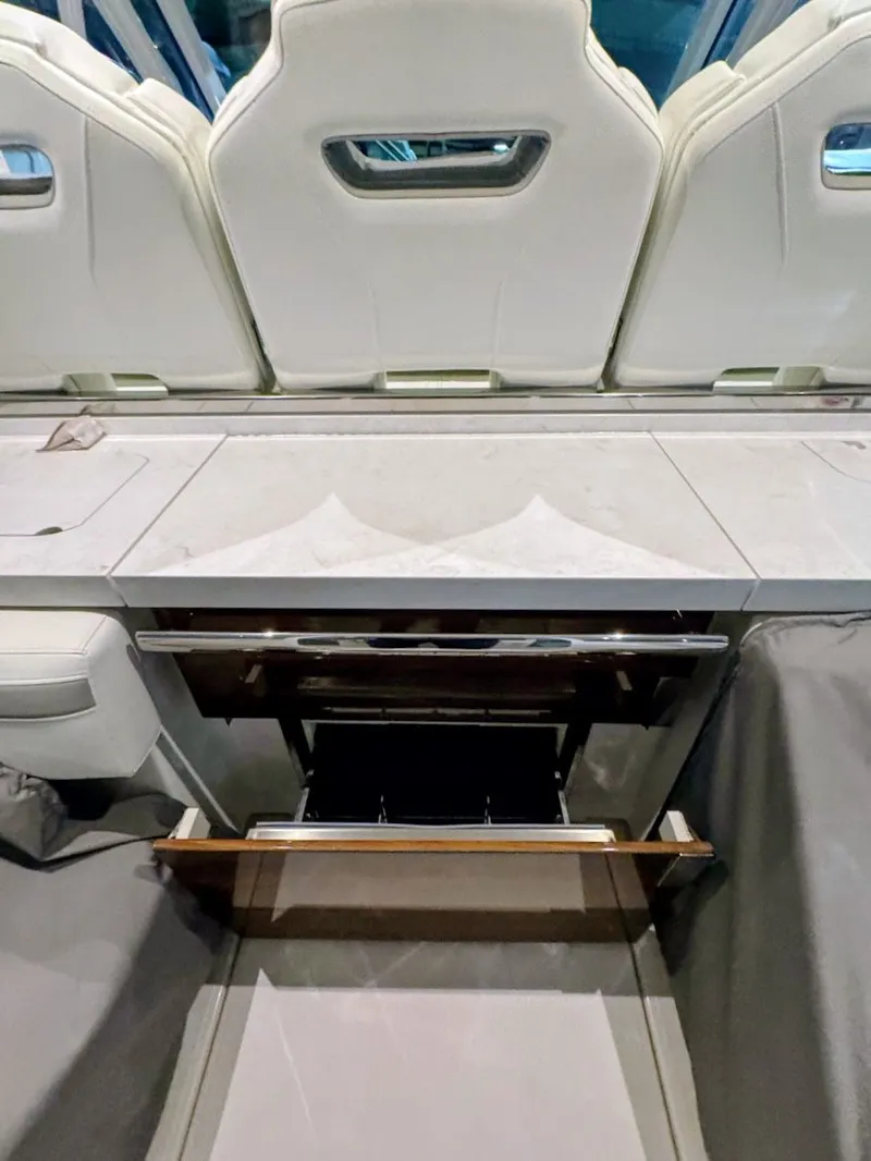 Slide: The Image of Interior of 2024 Tiara Yachts 38 LS with luxurious seating area. - 17