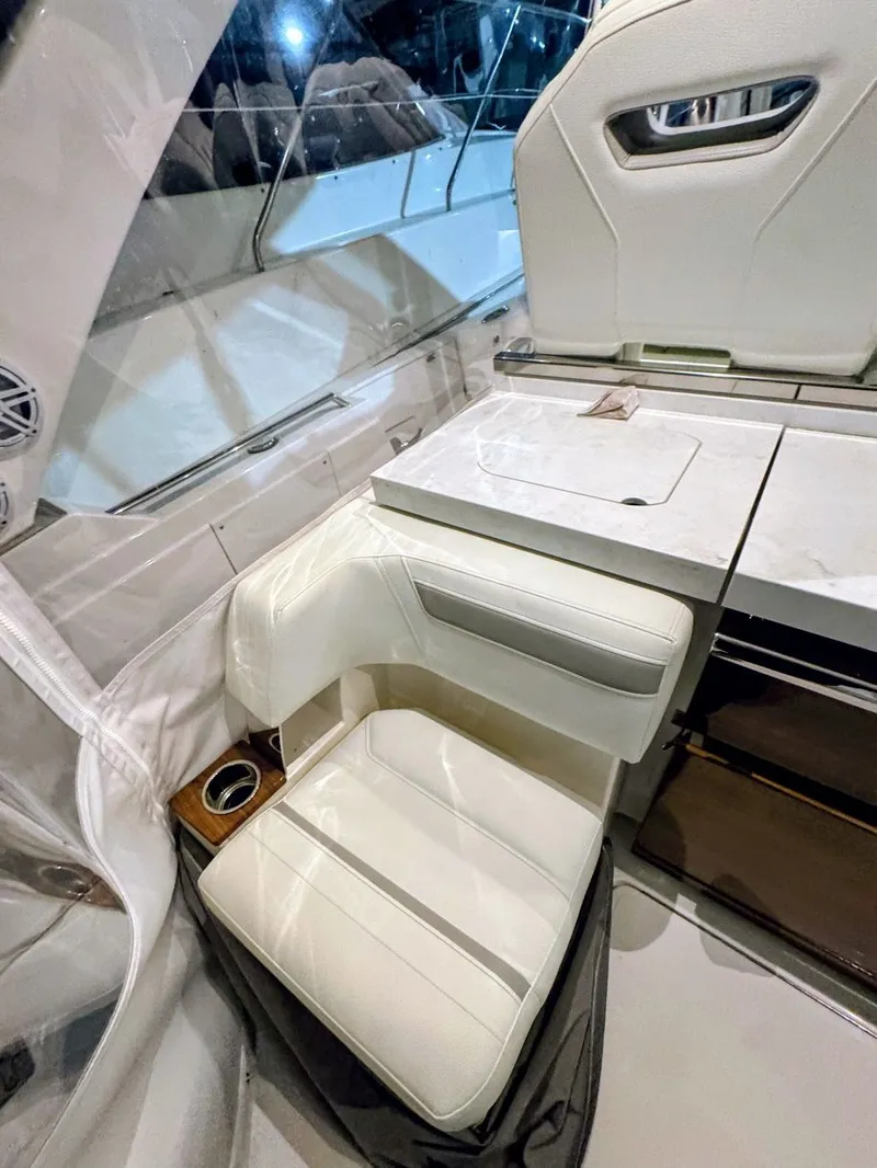 Slide: The Image of Interior of 2024 Tiara Yachts 38 LS featuring luxurious seating area. - 18
