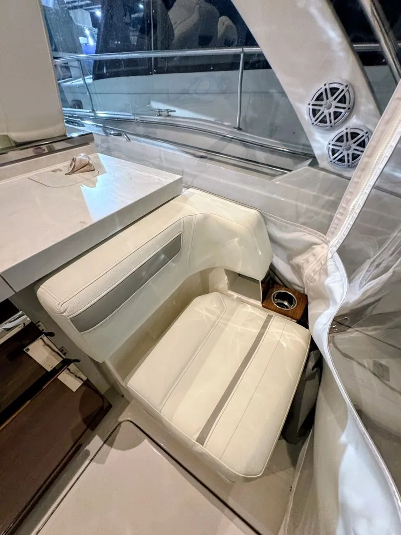 Slide: The Image of Interior of 2024 Tiara Yachts 38 LS featuring luxurious seating area. - 19