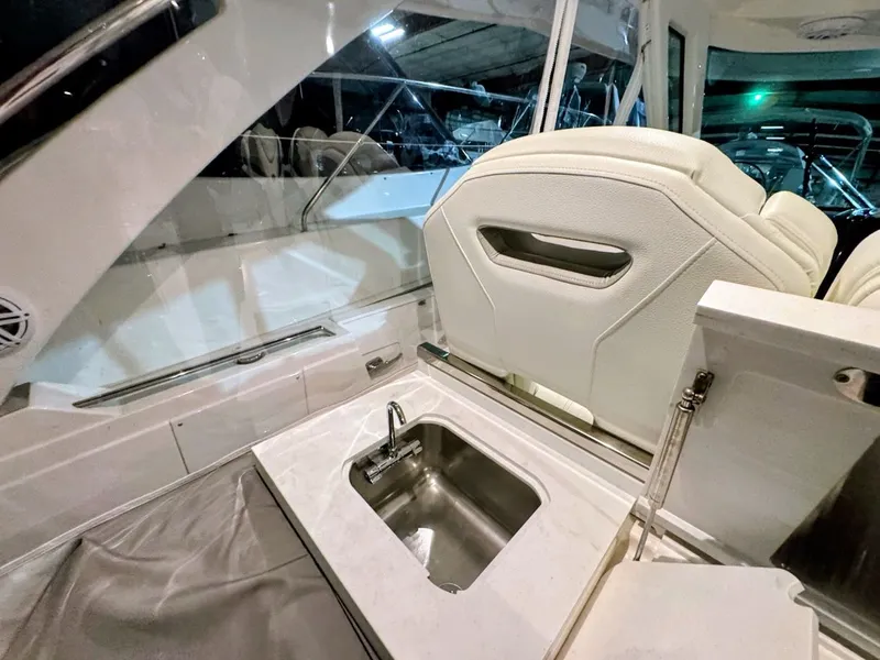 Slide: The Image of Interior of 2024 Tiara Yachts 38 LS with sink and seating area. - 20