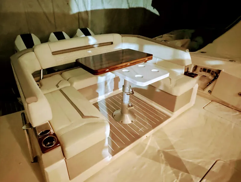 Slide: The Image of Interior of 2024 Tiara Yachts 38 LS with luxurious seating area. - 23