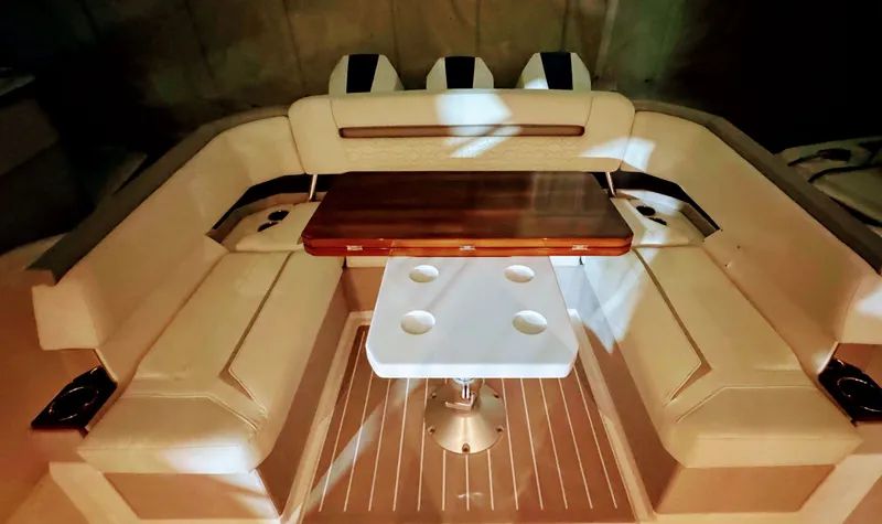 Slide: The Image of 2024 Tiara Yachts 38 LS interior seating and table. - 24