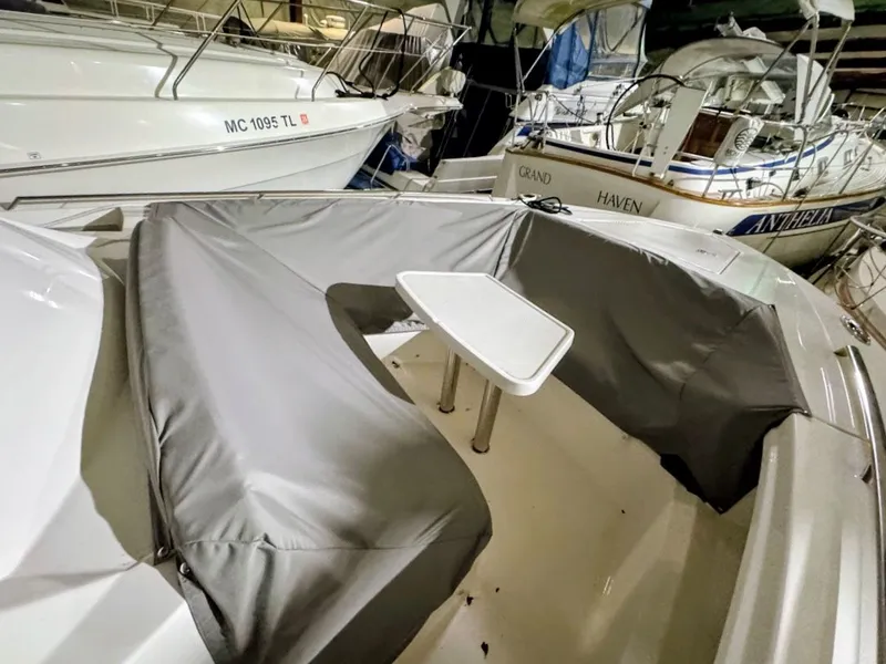 Slide: The Image of Interior view of 2024 Tiara Yachts 38 LS with gray cover. - 29