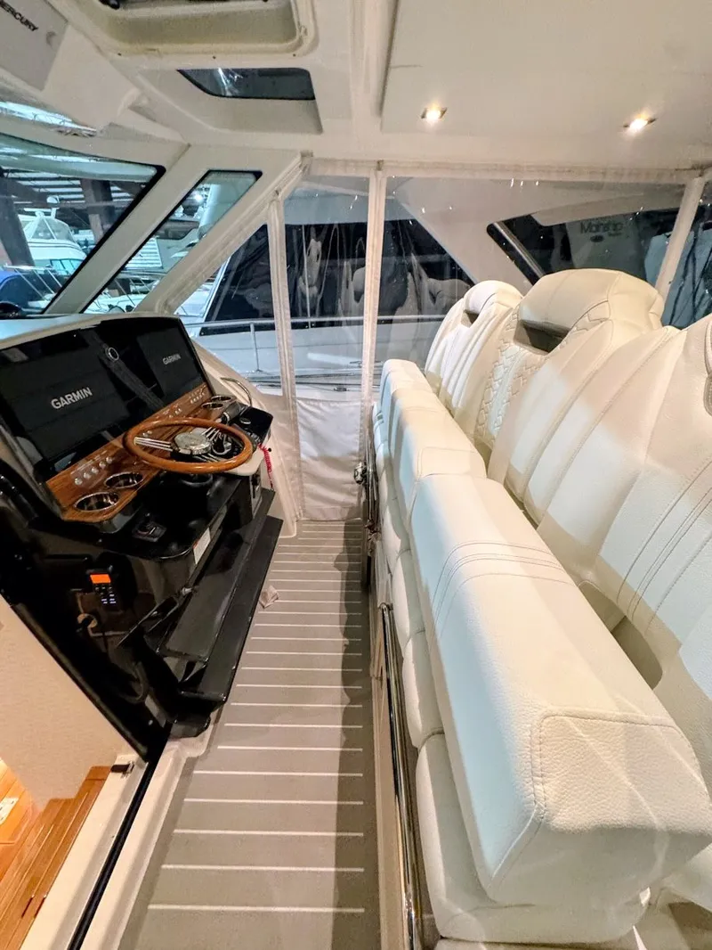 Slide: The Image of Interior of 2024 Tiara Yachts 38 LS with luxurious seating. - 3