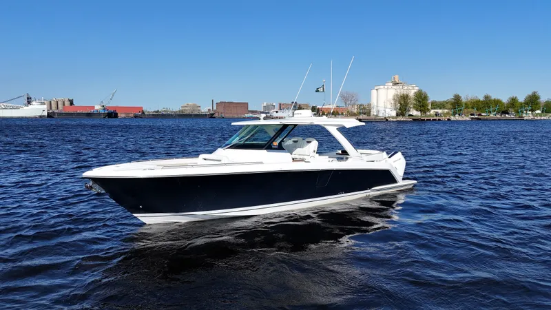 Slide: The Image of 2024 Tiara Yachts 38 LS on open water. - 30