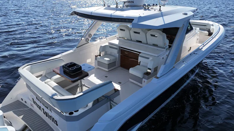 Slide: The Image of 2024 Tiara Yachts 38 LS on open water, luxurious design. - 34