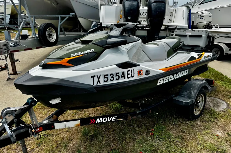The Image of 2019 Sea-Doo FishPro 155 jet ski on trailer, parked outdoors. - 0