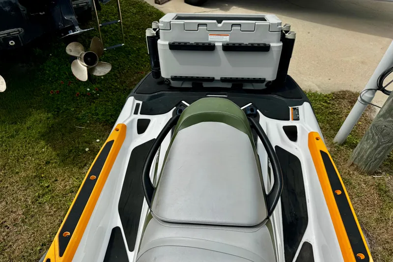 Slide: The Image of 2019 Sea-Doo FishPro 155 with storage box, viewed from above, parked on grass. - 10