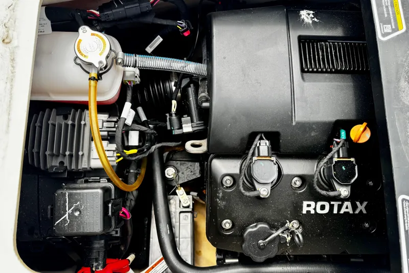 Slide: The Image of Engine compartment of 2019 Sea-Doo FishPro 155 with Rotax components visible. - 12