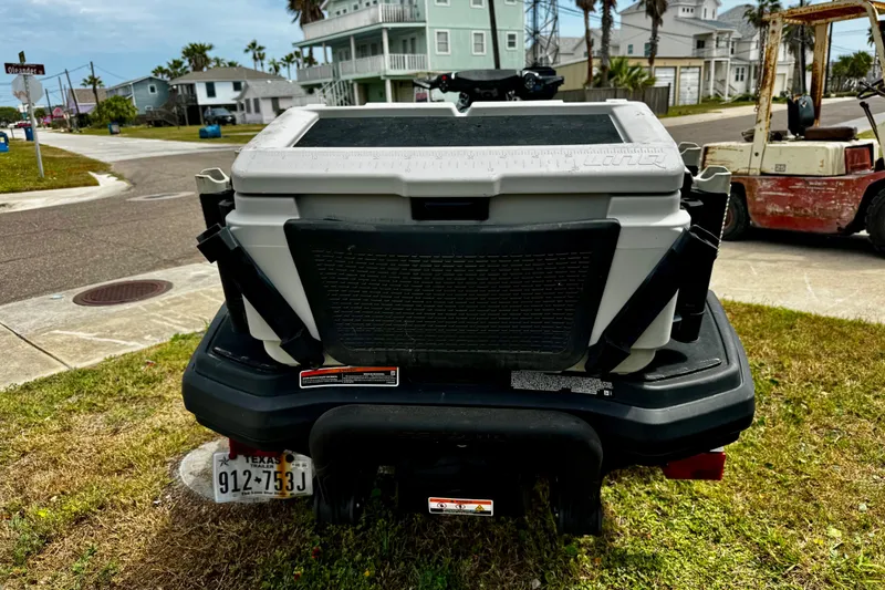 Slide: The Image of 2019 Sea-Doo FishPro 155 with cooler, parked in residential area. - 5